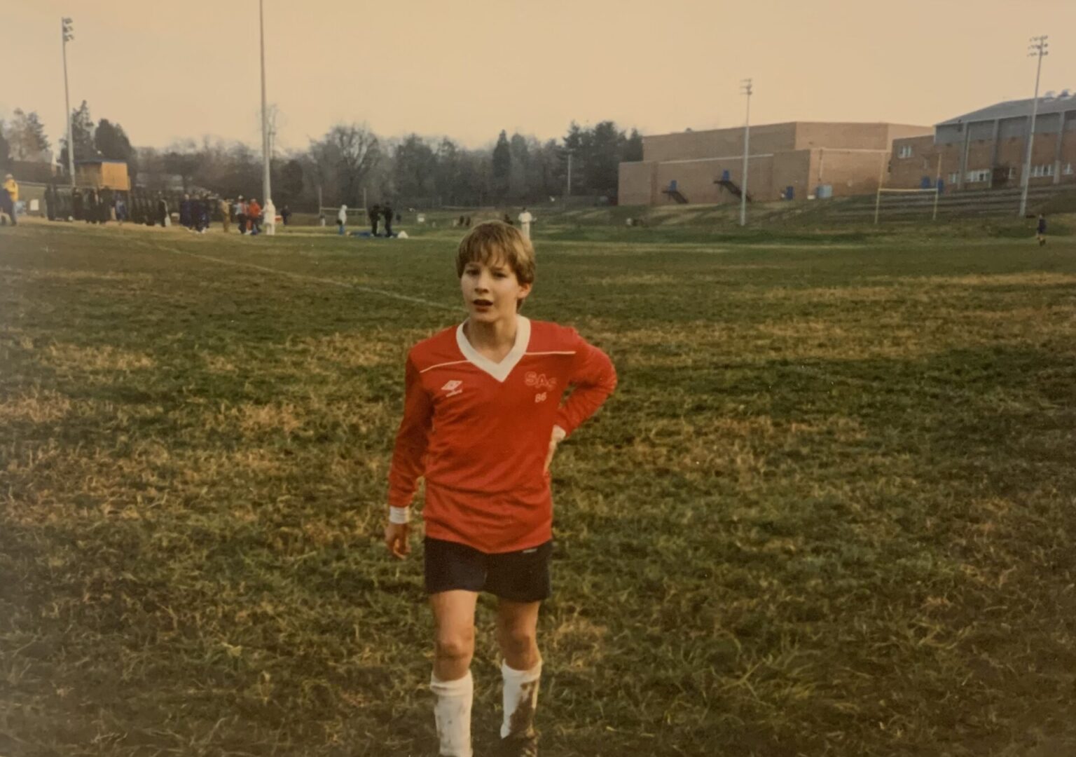 Soccer Player walking through the mid-field